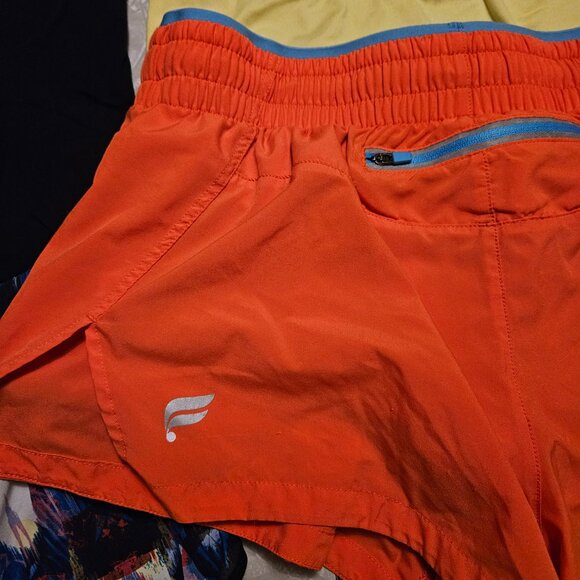 Fabletics XS bundle! Two tanks (muscle/open-back) and two shorts! - Picture 11 of 13
